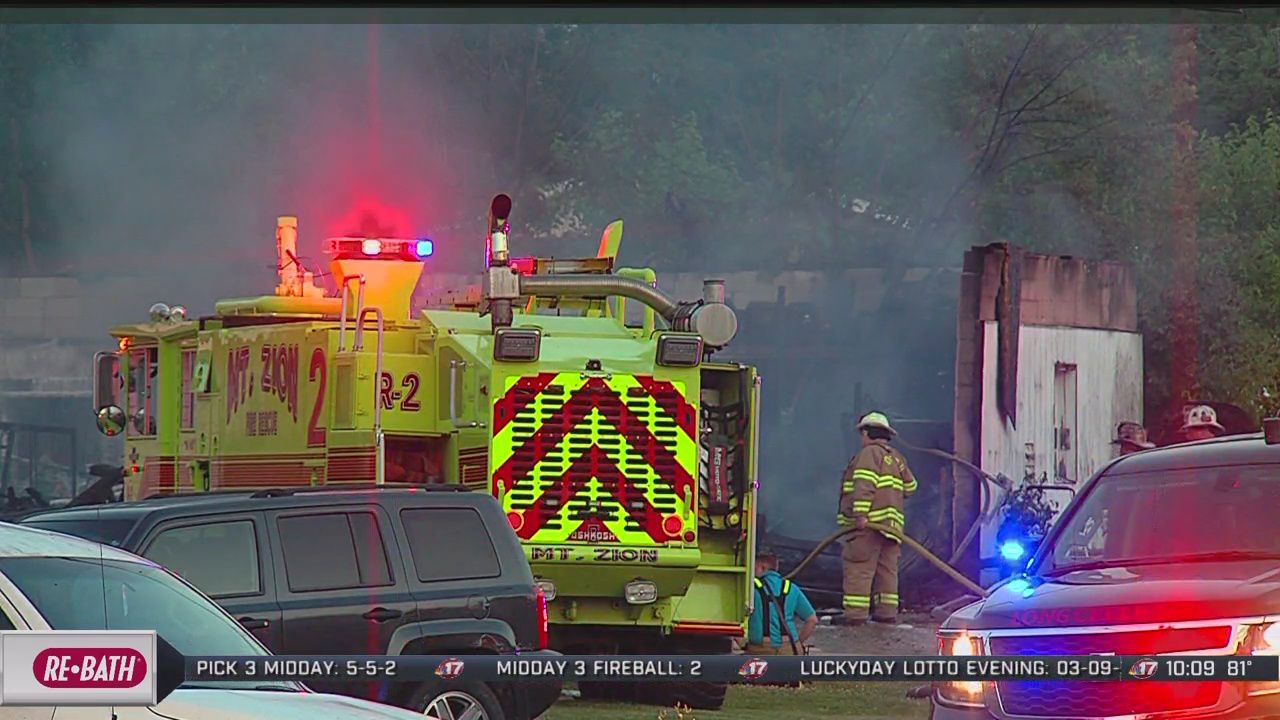Garage, racing cars inside destroyed in fire
